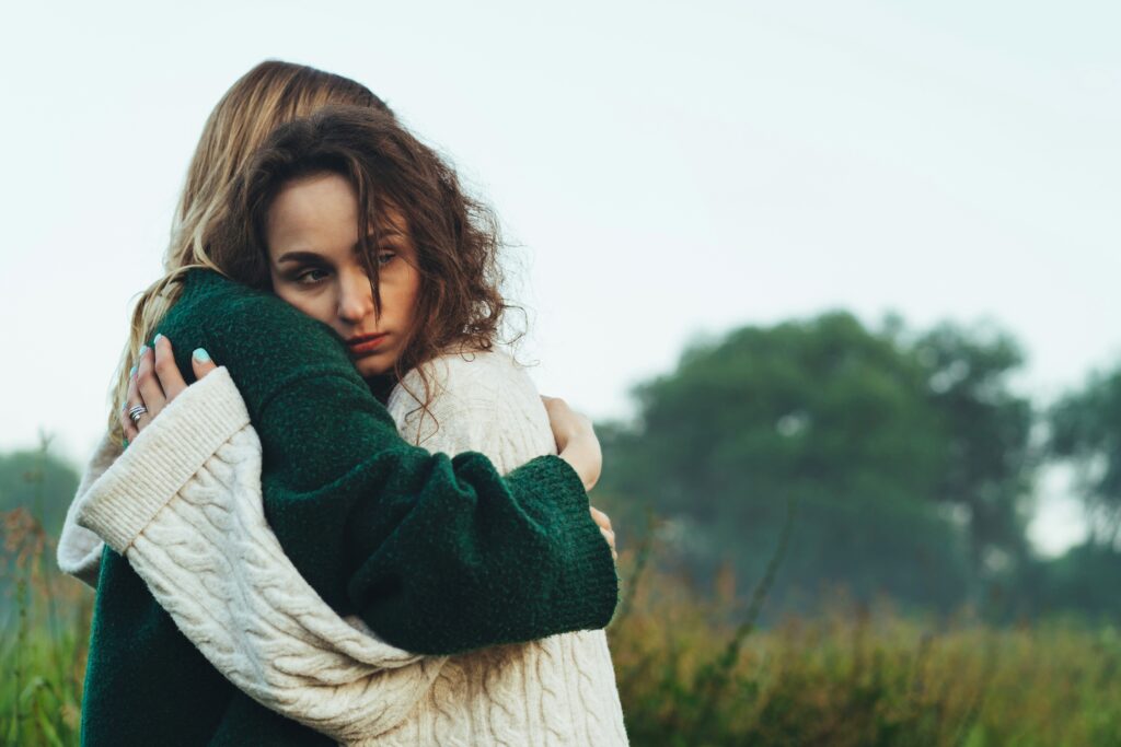 A young alcoholic finding comfort in a friend